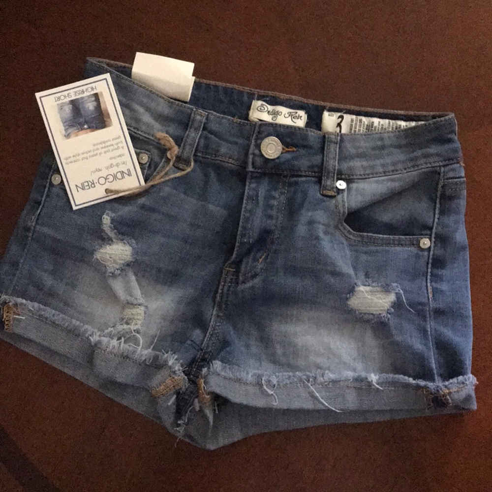 Blue denim high rise ripped shorts